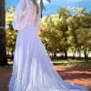 Vestido de Noiva Longo em Renda com Manga Longa em Tule Poá e Cauda